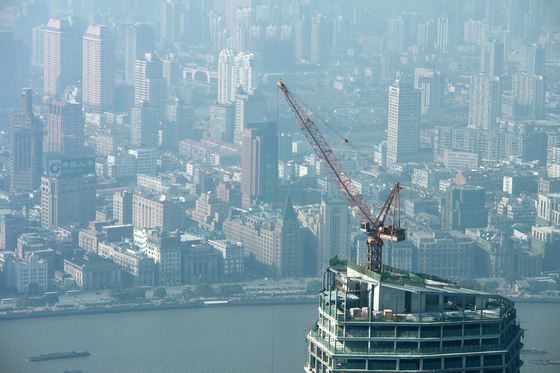 Bilanţul prăbuşirii unei clădiri din Shanghai a ajuns la 10 morţi